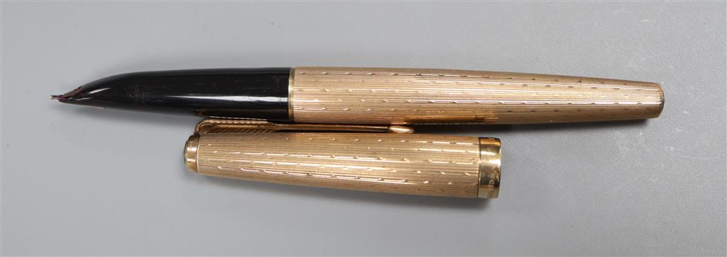 A cased 9ct Parker pen